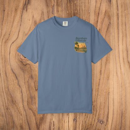 Bayshore Lifestyle Tee in cool blue hue, featuring an eye-catching palm tree design on a comfortable 100% cotton fabric, perfect for any season.