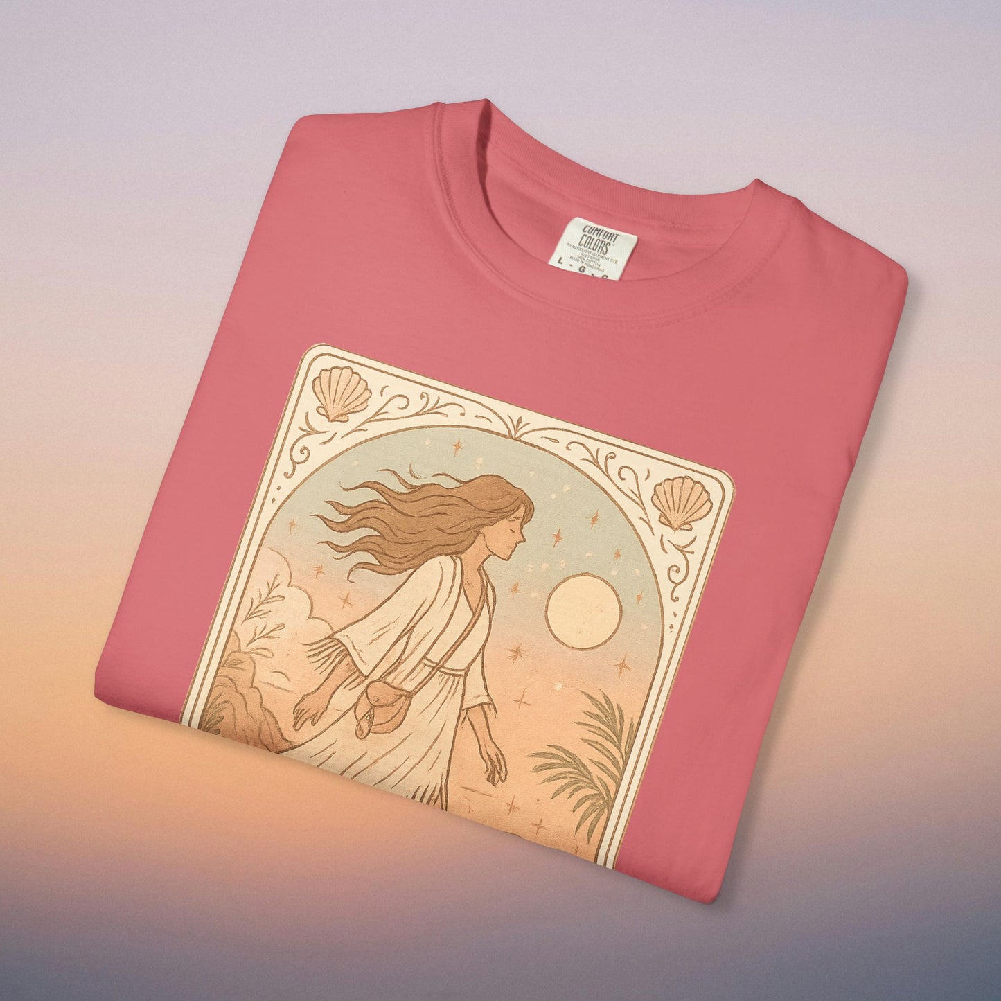 Wanderer Tarot Graphic Tee in vibrant coral pink, displaying a charming design of a woman moving gracefully through nature, made from ethically crafted 100% cotton and available in sizes S to 4XL.