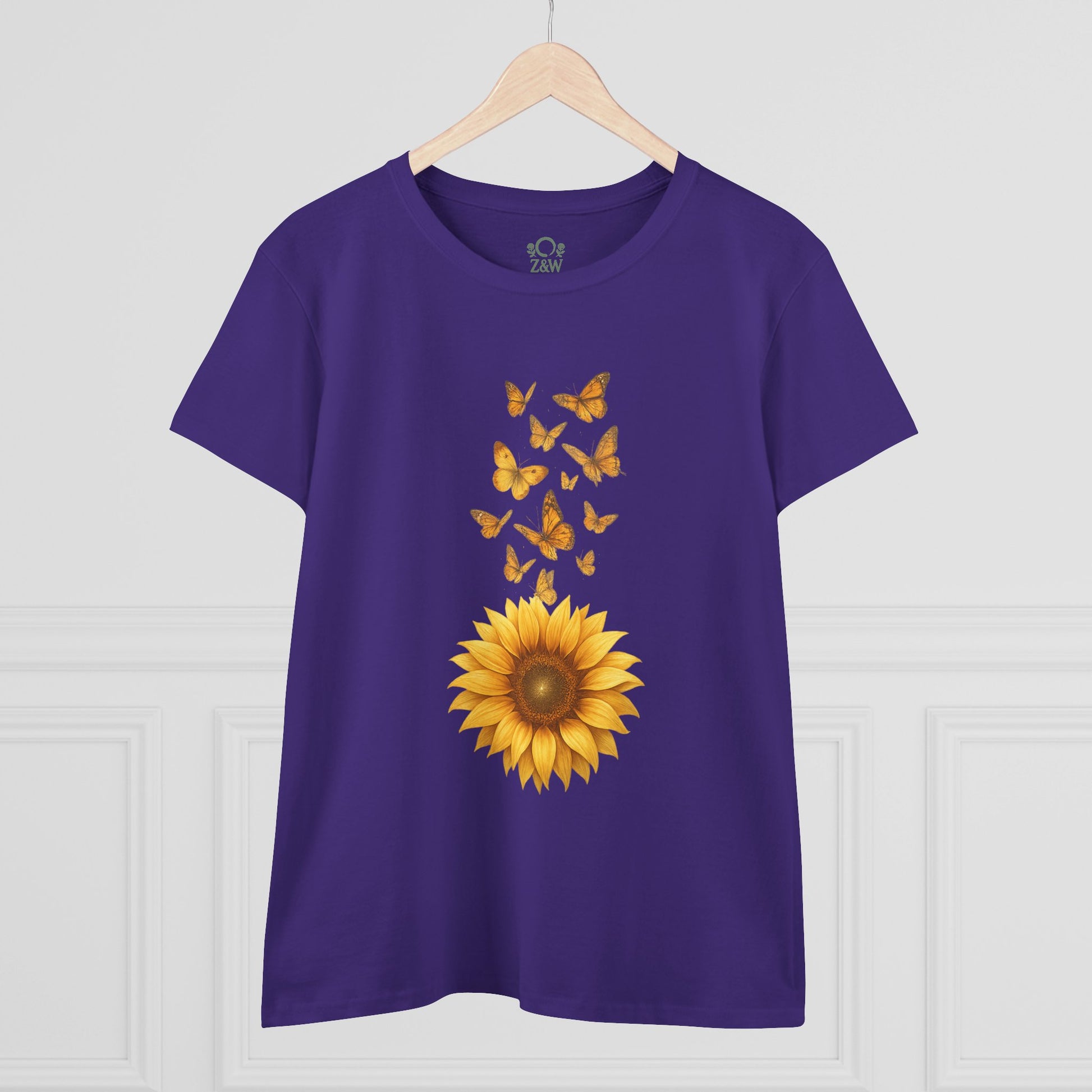 Sunflower & Butterflies Cotton Tee for Women - 100% Soft Cotton, Breathable, Durable Design, presenting a vibrant sunflower and butterflies design on a purple backdrop.