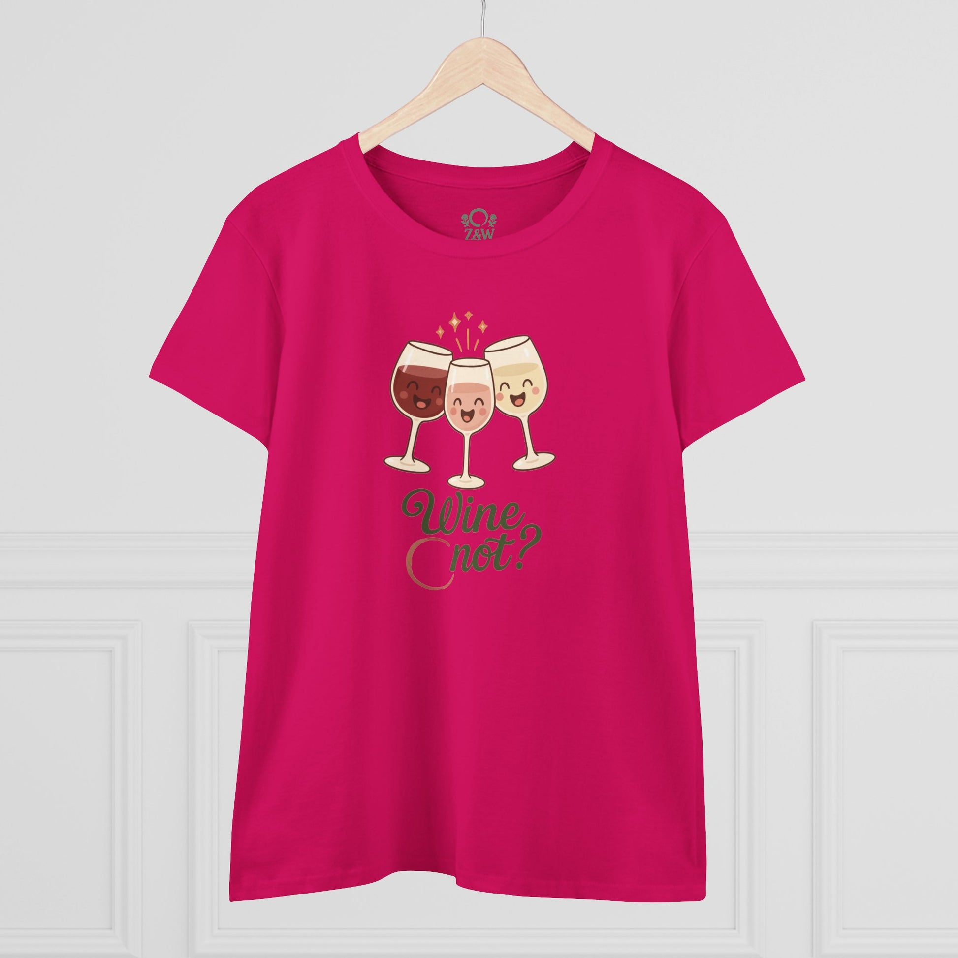 Front view of the Wine Not Tee in pink with a cheerful illustration of wine glasses and the phrase 'Wine Not?', perfect for wine lovers and casual outings.