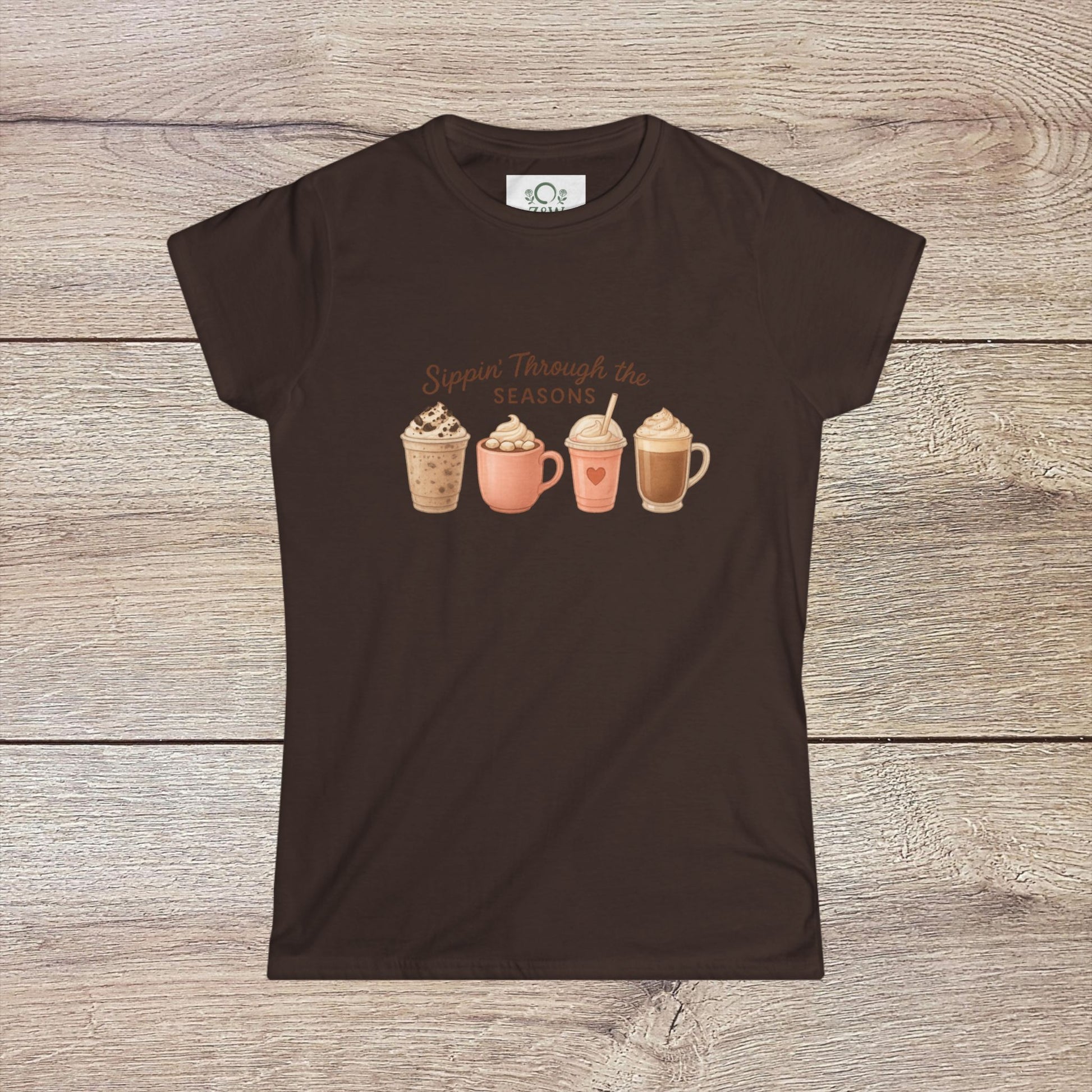 Sippin' Through The Seasons Slim Fit Tee featuring a playful design of four different coffee drinks. Made from 100% combed cotton, this lightweight tee is perfect for any casual occasion.