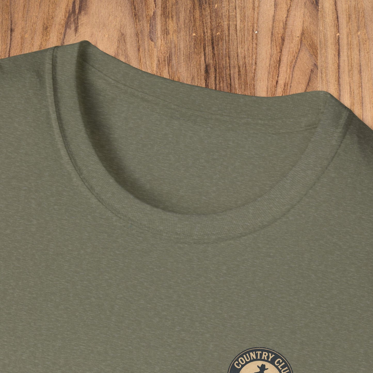 Close-up of the collar and emblem of the Vintage Southern Gentleman Golf Shirt - Country Club Outlaw Cowboy Tee, emphasizing its quality craftsmanship.