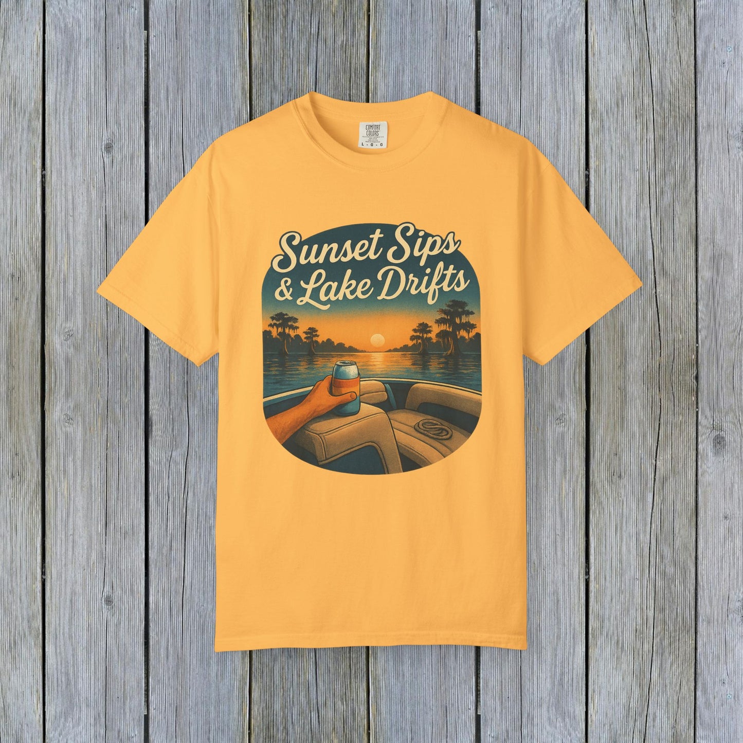 Lake Drifts T-Shirt in sunny yellow showcasing a vibrant sunset design with a drink in hand, ideal for summer outings.
