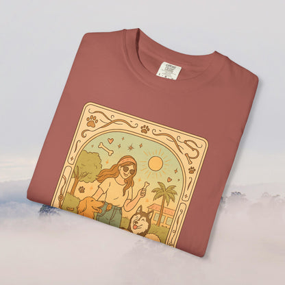 Animal Lover Tarot Tee in earthy red displaying a charming design of a pet lover with her dogs under the sun, made from comfortable 100% cotton, available from sizes S to 4XL.
