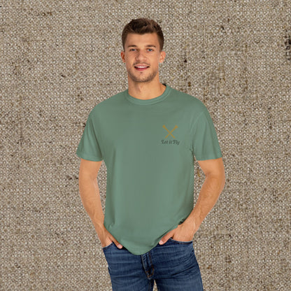 Model wearing the 'Tee It High Let It Fly Graphic Tee', displaying a stylish fit and vibrant color, perfect for golf enthusiasts.