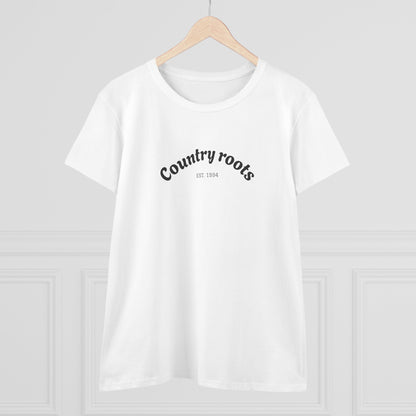 Front view of Country Roots Cowgirl Tee hanging, highlighting the elegant 'Country roots EST. 1994' logo against a clean backdrop.
