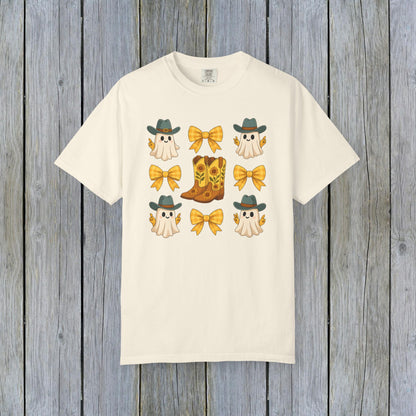 Cute Halloween T-Shirt featuring ghosts in cowboy hats and cowboy boots with yellow bows, unisex fall fashion made of eco-friendly fabric.