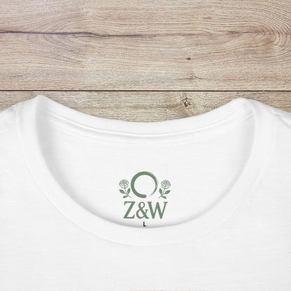 Wildflowers T-Shirt - White smooth fabric with ribbed collar featuring logo detail, offering a stylish and comfortable fit, ethically sourced.