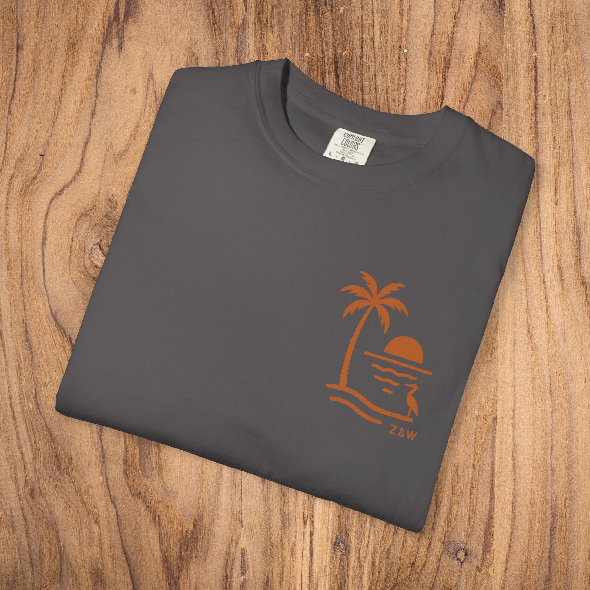 Unisex Sunset Palm Tree T-Shirt - Vibrant Garment-Dyed Cotton Tee for Men & Women in Slate Gray with artistic palm tree and sunset design.