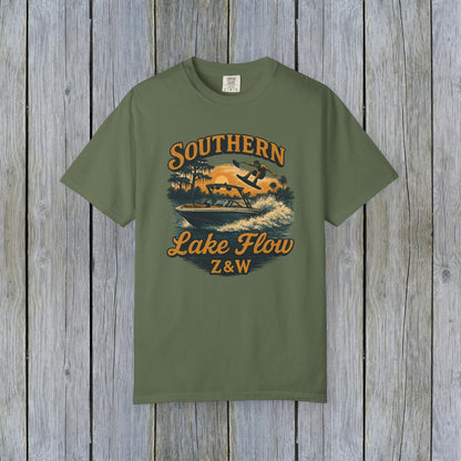 Southern Lake Flow T-Shirt in green, featuring a vibrant graphic of a person water skiing, made from eco-friendly 100% US cotton, available in sizes S-4XL.