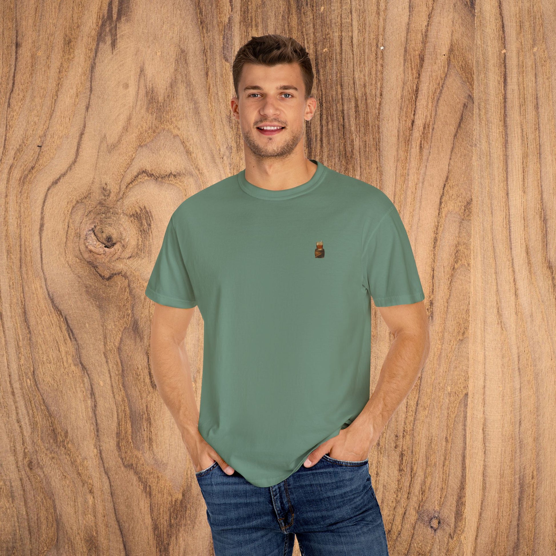 A man wearing the Premium Southern Made T-Shirt in green, featuring minimalistic style, ideal for trendy casual wear.