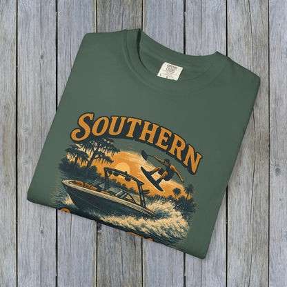 Southern Lake Flow T-Shirt laid flat in olive green, highlighting its unique, eco-friendly design with nautical theme, made of 100% US cotton for comfort.