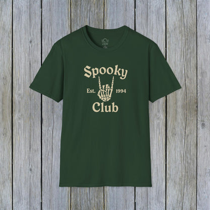 Unisex Spooky Club Tee in green, made of durable 100% cotton, showcasing a unique skeleton hand design and 'Spooky Club Est. 1994' lettering, ideal for festive occasions.
