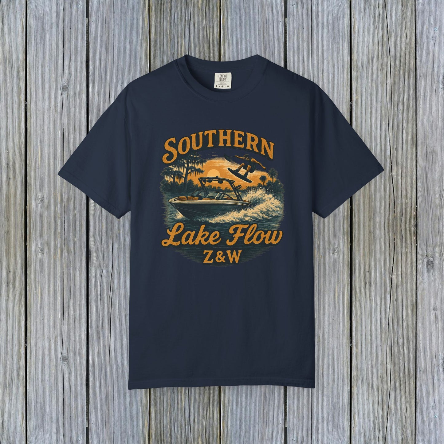 Southern Lake Flow T-Shirt in navy blue, highlighting a stylish graphic of a water skier, made of eco-friendly 100% US cotton, sizes available from S to 4XL.