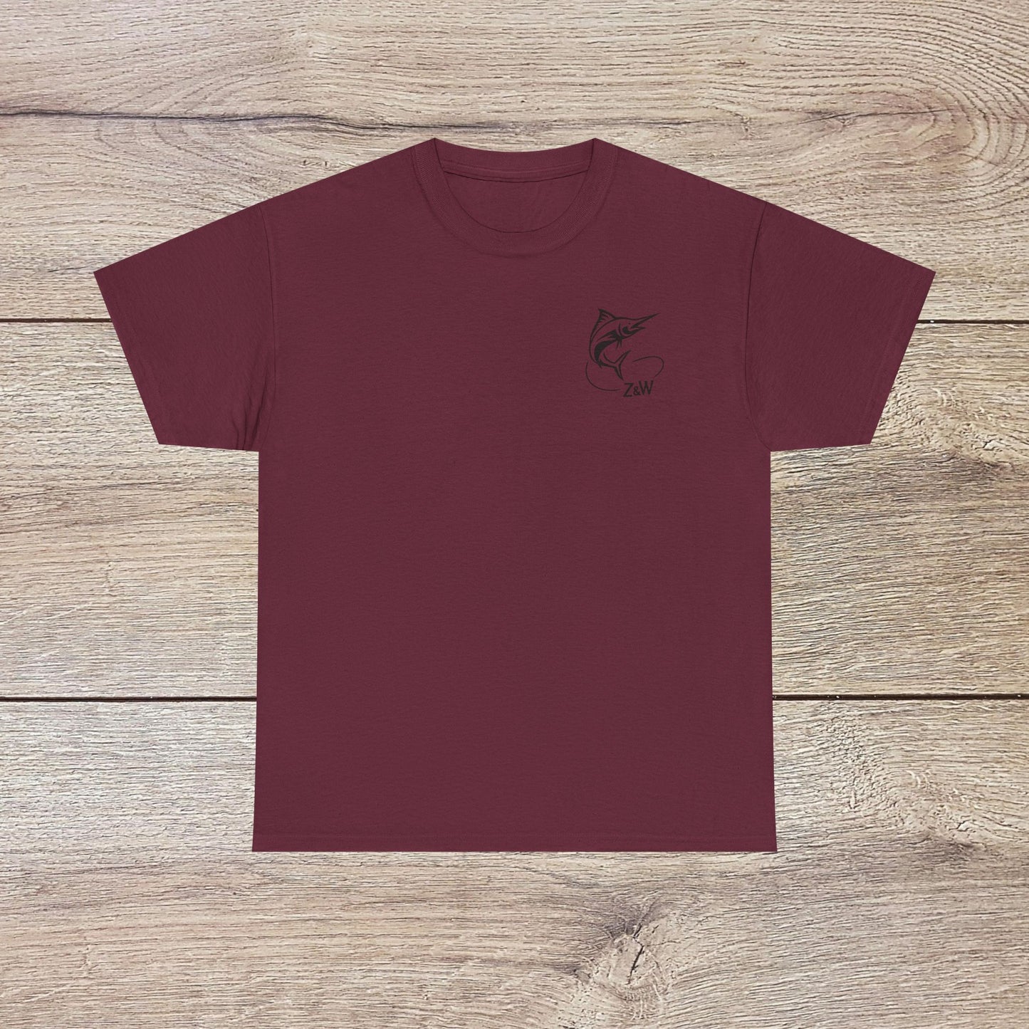 Fishing Adventure Tee - Unisex Heavy Cotton Shirt for Nature Lovers, presented in a rich burgundy color with a unique marlin design, great for summer gatherings and adventures.