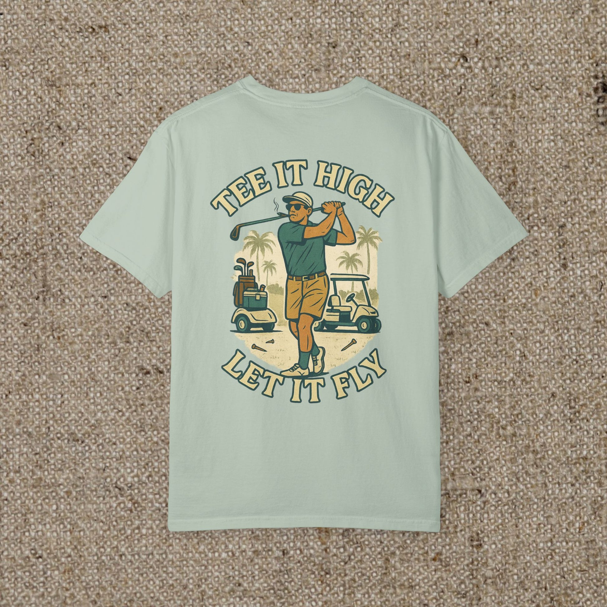 Back view of Tee It High Let It Fly Graphic Tee in light mint green, showcasing a vibrant golfing graphic, making it perfect for golf enthusiasts.