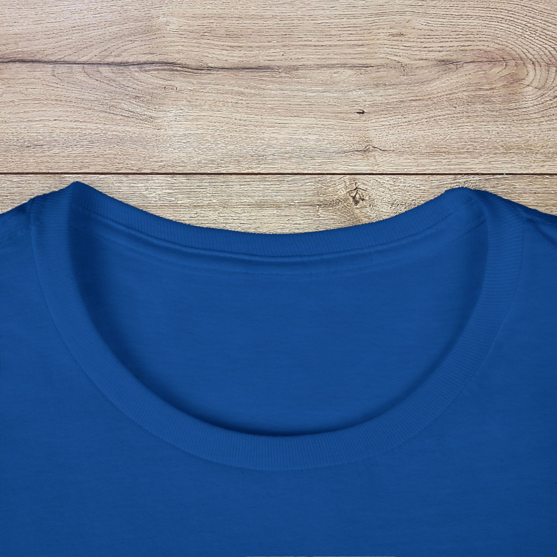 Close-up of the neckline on the Golf Wives Social Club Tee in blue, highlighting the highly elastic ribbed knit collar that retains its shape and adds comfort.