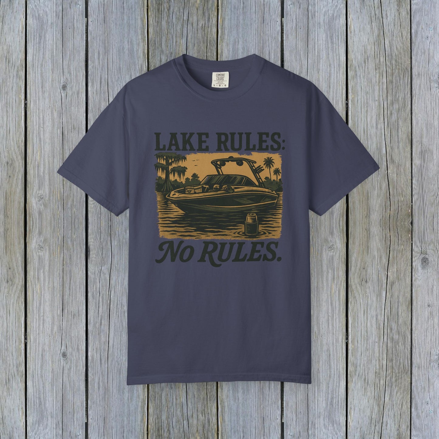 Unisex Garment-Dyed Lake Rules Tee featuring a vintage boat design with the text 'Lake Rules: No Rules.' Perfect for outdoor enthusiasts.