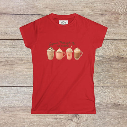 Sippin' Through The Seasons Slim Fit Tee in red displaying a vibrant illustration of four stylish coffee mugs, perfect for anyone who enjoys seasonal beverages.