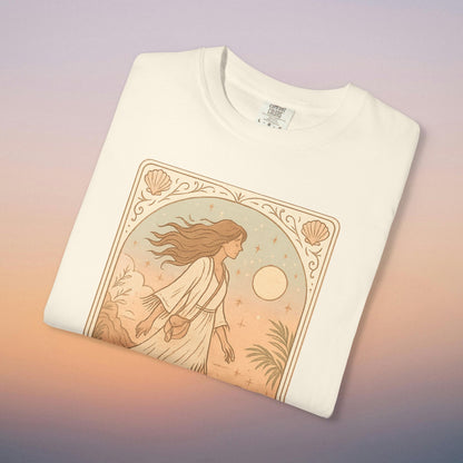 Wanderer Tarot Graphic Tee in classic white color, showcasing a beautiful design of a woman surrounded by a soothing nature scene, made from ethically sourced 100% cotton, available in sizes S to 4XL.