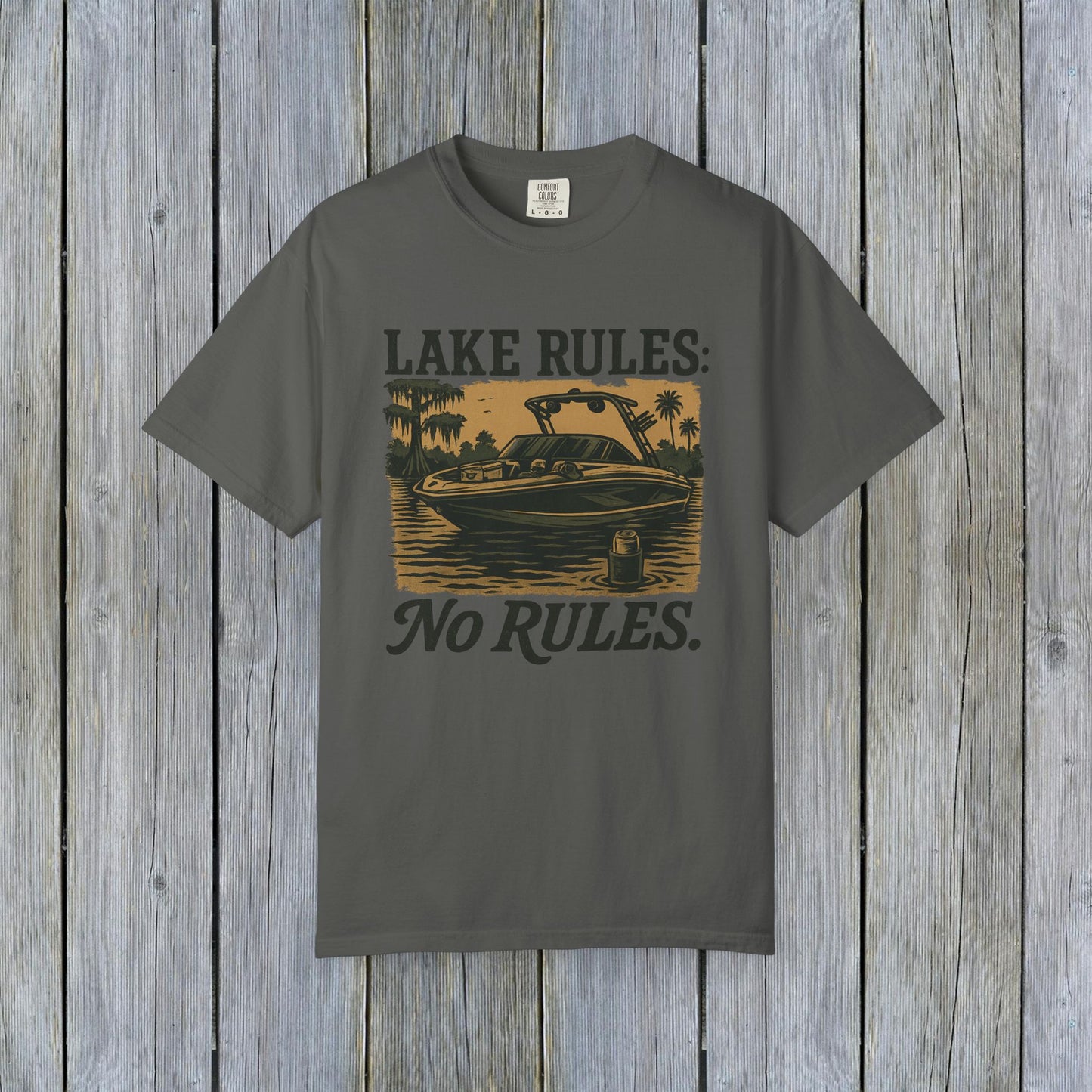 Unisex Garment-Dyed Lake Rules Tee in dark gray color featuring a lake scene with the text 'Lake Rules: No Rules.', crafted from soft vintage fabric, perfect for outdoor activities.