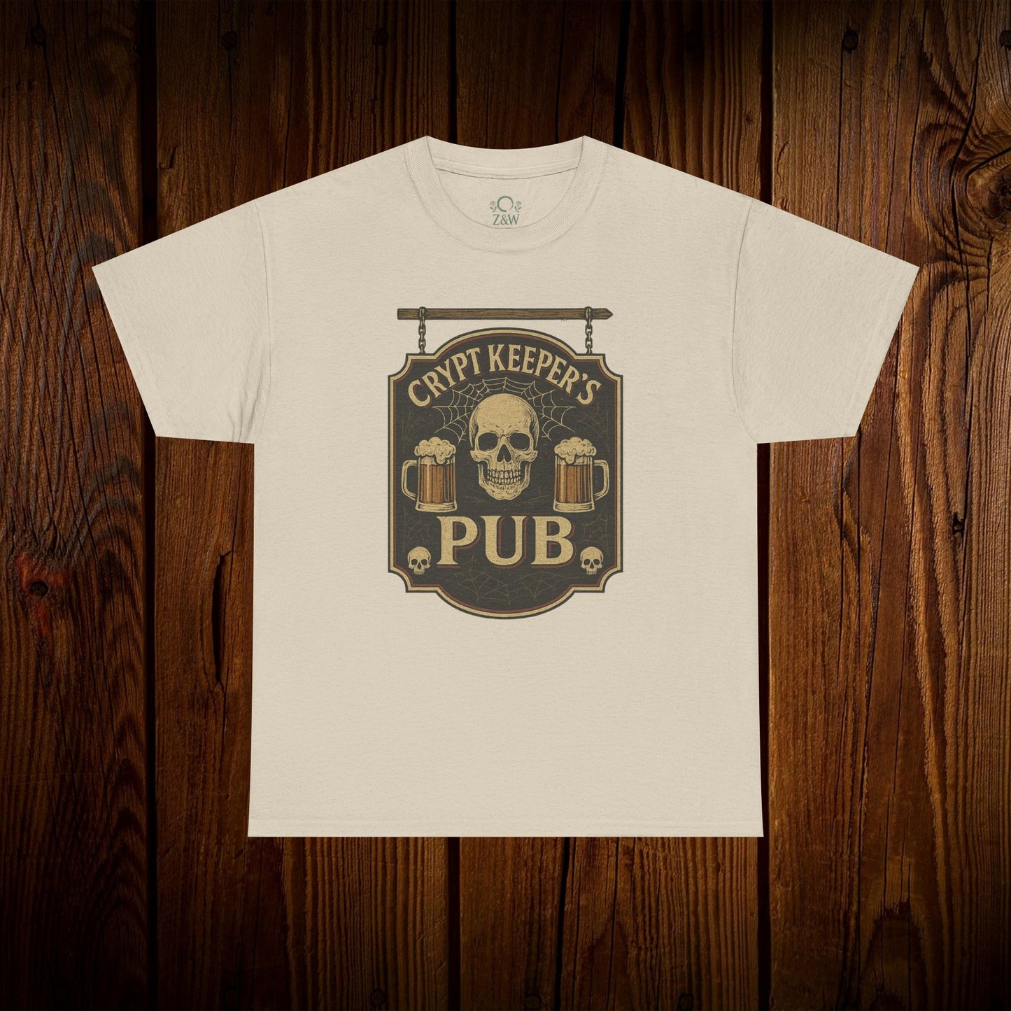Crypt Keeper's Pub Tee featuring a skull and beer mugs on a vintage sign, perfect for Halloween and pub crawls.