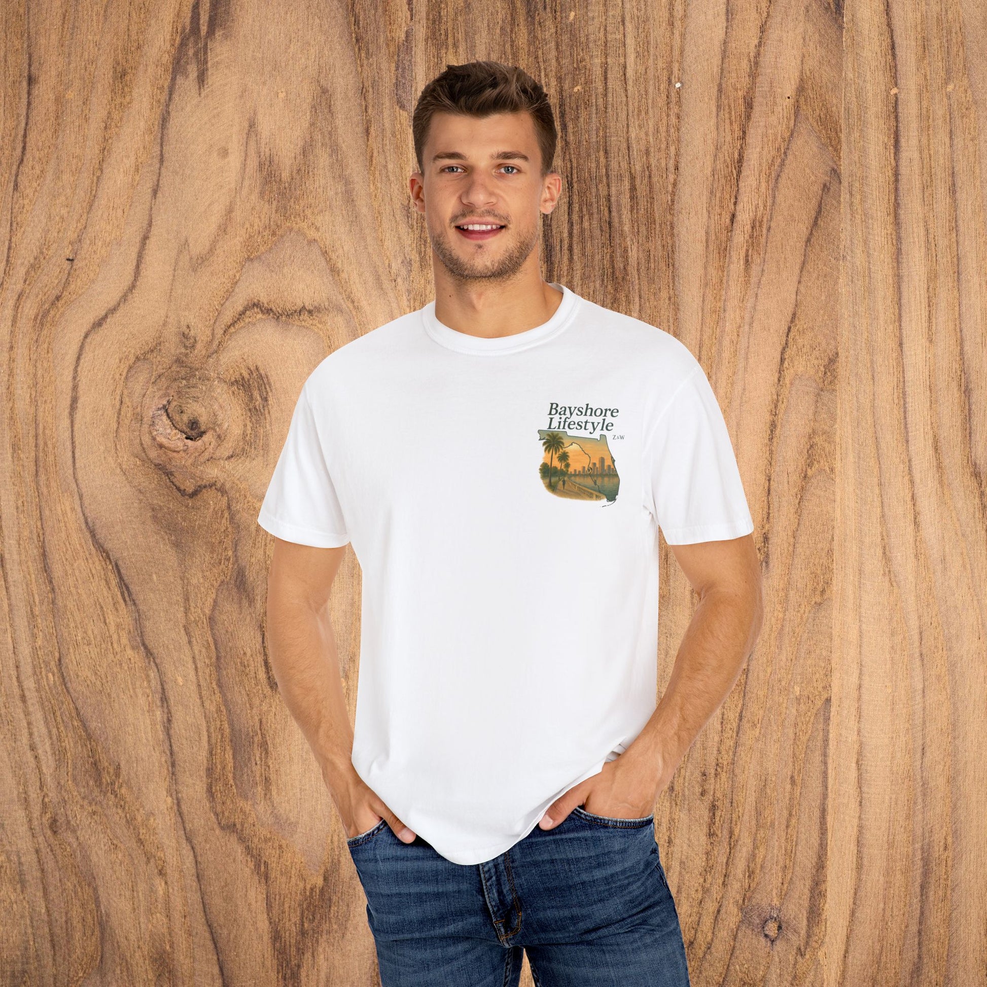 Bayshore Lifestyle Tee - Model wearing a white 100% cotton t-shirt with a graphic design, demonstrating casual style and fit.