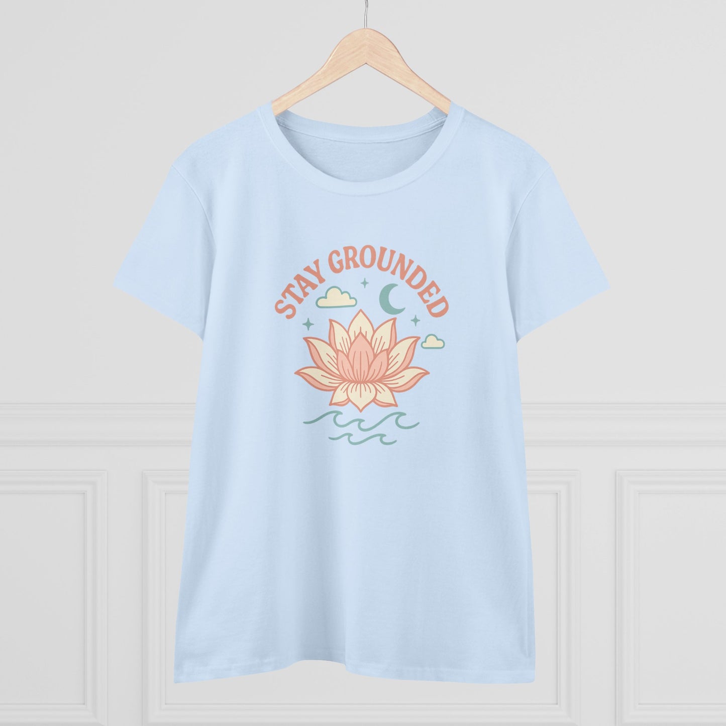 Stay Grounded Spiritual Tee - Light blue crop top showcasing a stylish lotus flower illustration, great for vacations and outdoor events.