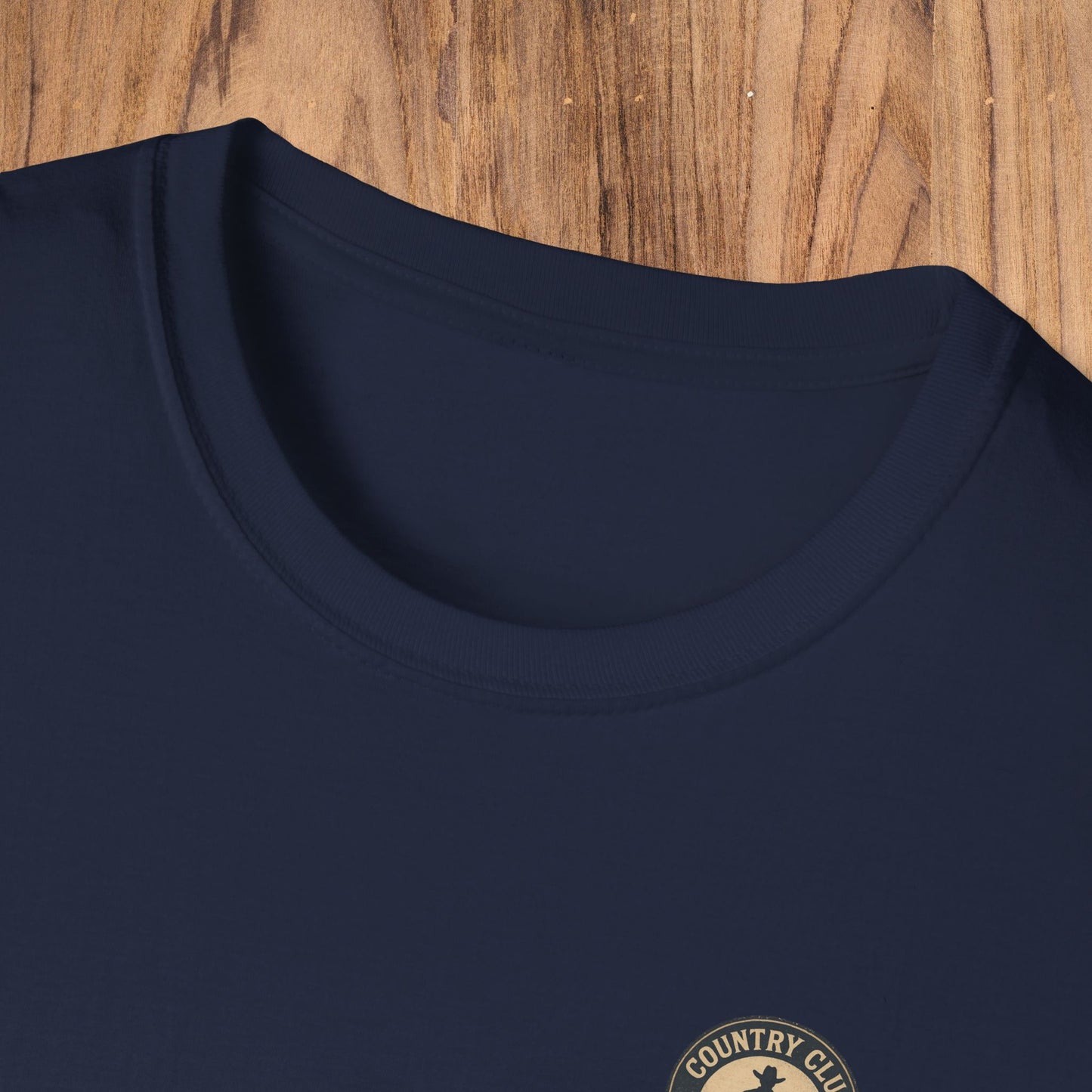 Close-up of the crew neckline of the navy Vintage Southern Gentleman Golf Shirt - Country Club Outlaw Cowboy Tee, emphasizing comfort and style.