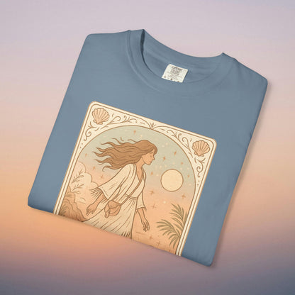 Wanderer Tarot Graphic Tee in blue color, featuring an enchanting design of a woman among nature, made from 100% ethically made cotton, available in a range of sizes from S to 4XL.