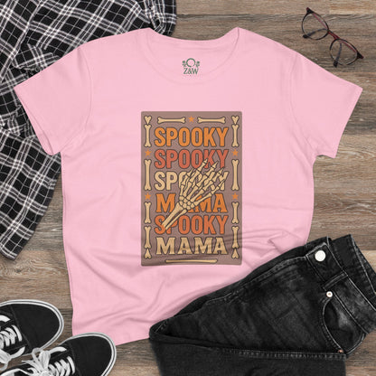 Casual outfit featuring the pink Spooky Mama Tee with a skeleton hand graphic, styled with black jeans and sneakers, emphasizing comfort and style for all occasions.
