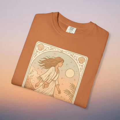 Wanderer Tarot Graphic Tee in warm terracotta, featuring a stunning artistic representation of a woman with a mystical backdrop. This uniquely styled tee is ethically made with 100% cotton and available in sizes S to 4XL.