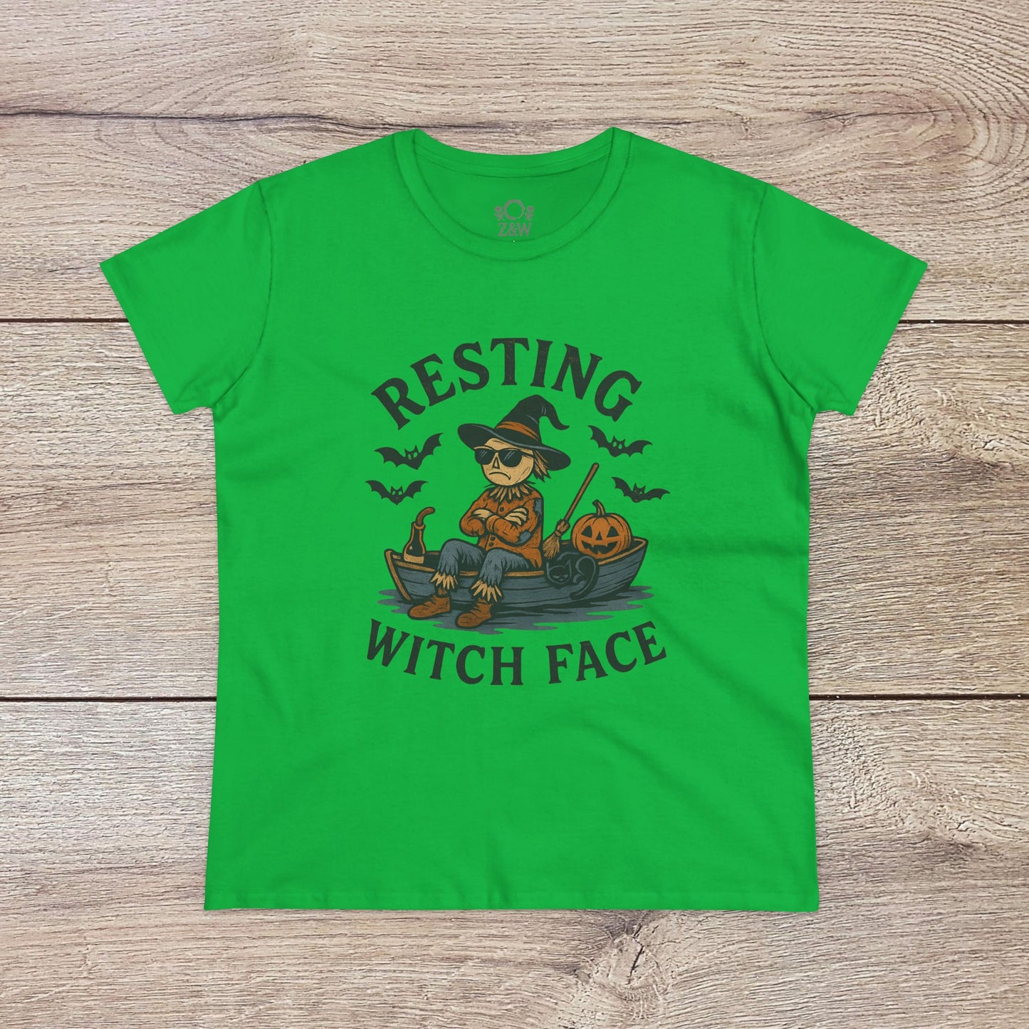 Resting Witch Face Halloween T-Shirt for Women in vibrant green color, featuring a playful design of a witch with sunglasses, perfect for parties and gifts.
