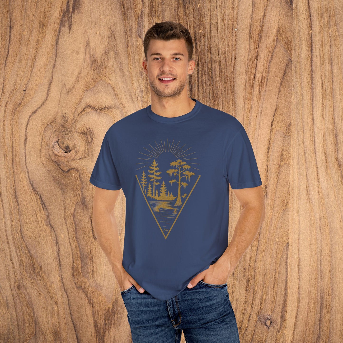 Nature Outdoor Vibes Tee - Soft 100% US Cotton, model displaying a navy T-shirt with a stylish forest print, great for adding flair to your outdoor wardrobe.