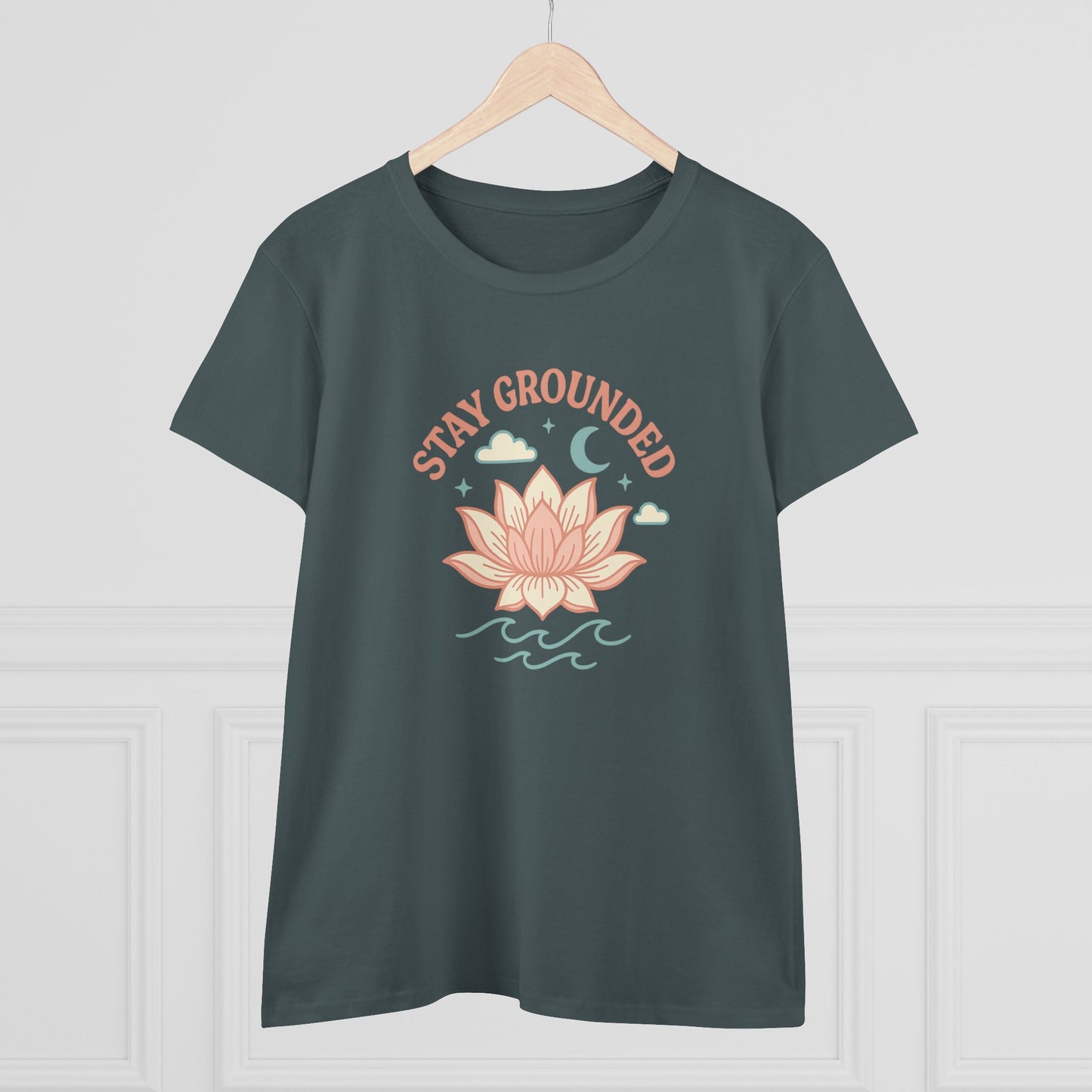 Stay Grounded Spiritual Tee displayed on a hanger, highlighting the elegant lotus illustration and relaxed fit, great for summer vibes.