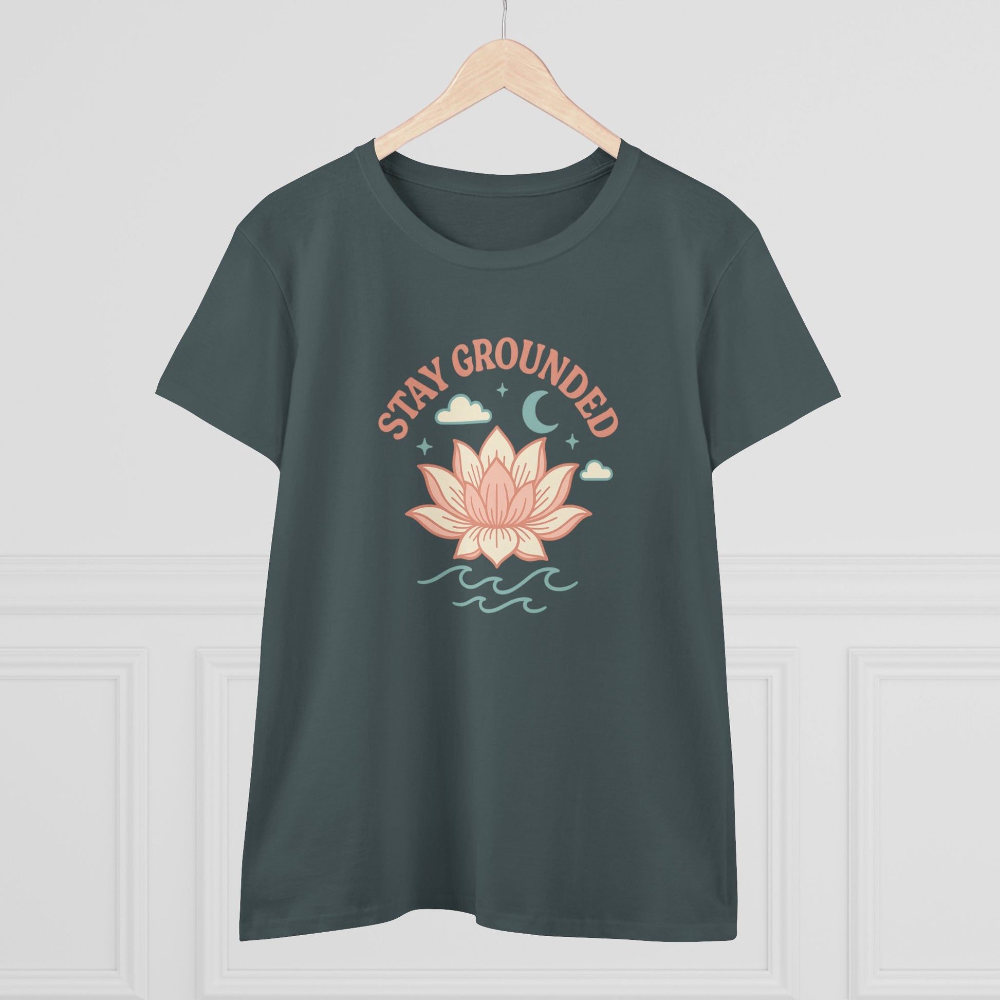 Stay Grounded Spiritual Tee displayed on a hanger, highlighting the elegant lotus illustration and relaxed fit, great for summer vibes.
