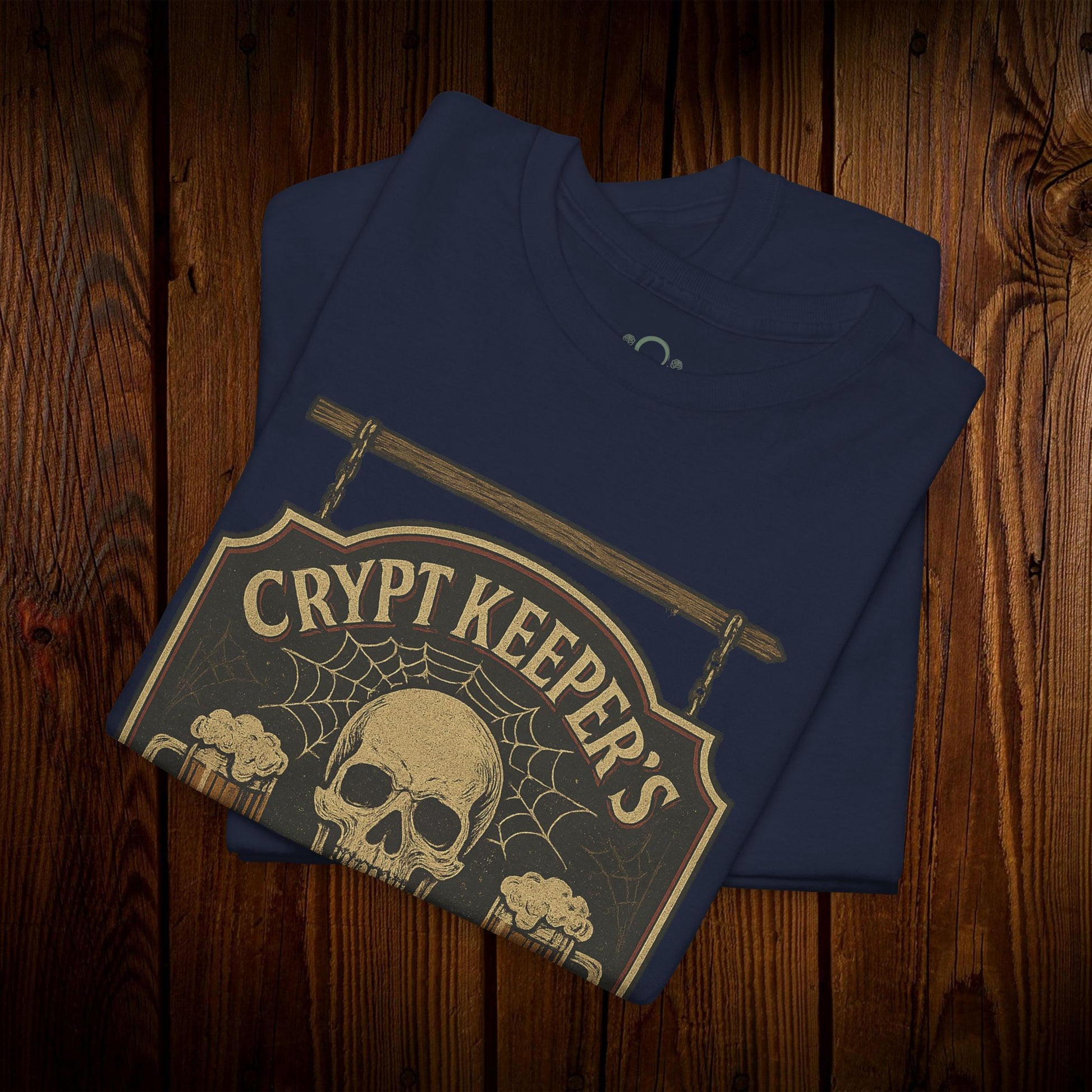 Crypt Keeper's Pub Tee in navy blue, featuring an eye-catching skull design suitable for Halloween festivities and casual outings.