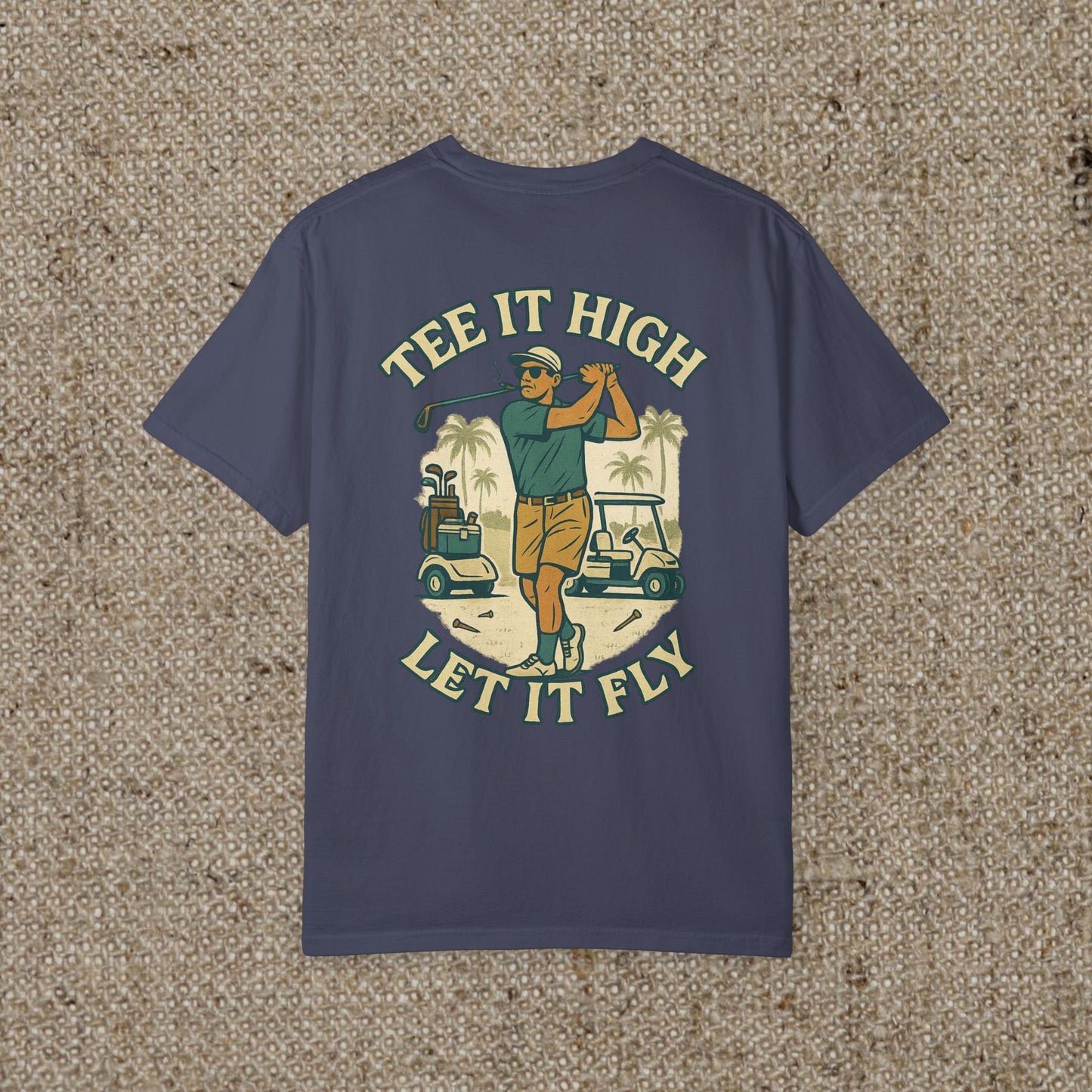 Tee It High Let It Fly Graphic Tee in a navy color, displaying a golfer with a vibrant design, suitable for golf and casual outings.