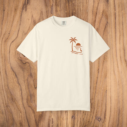 Unisex Sunset Palm Tree T-Shirt in white, showcasing a modern palm tree sunset design, constructed from comfortable garment-dyed cotton, suitable for any casual occasion.