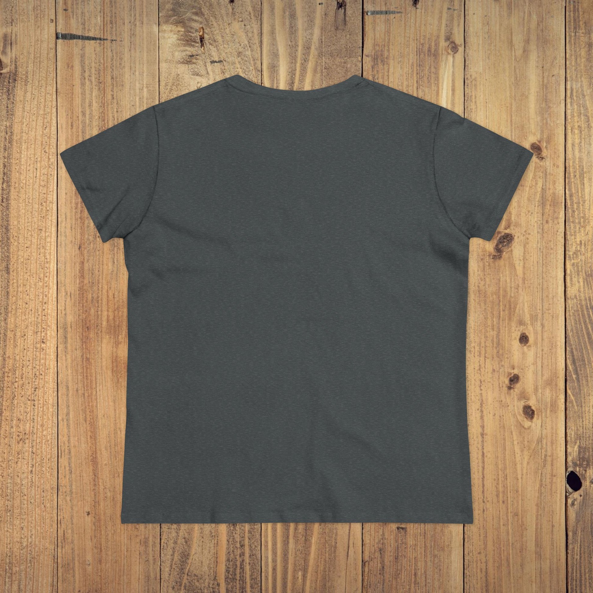 Back view of Stay Grounded Spiritual Tee, a comfortable crop top perfect for festivals and casual outings, displayed against a wooden backdrop.