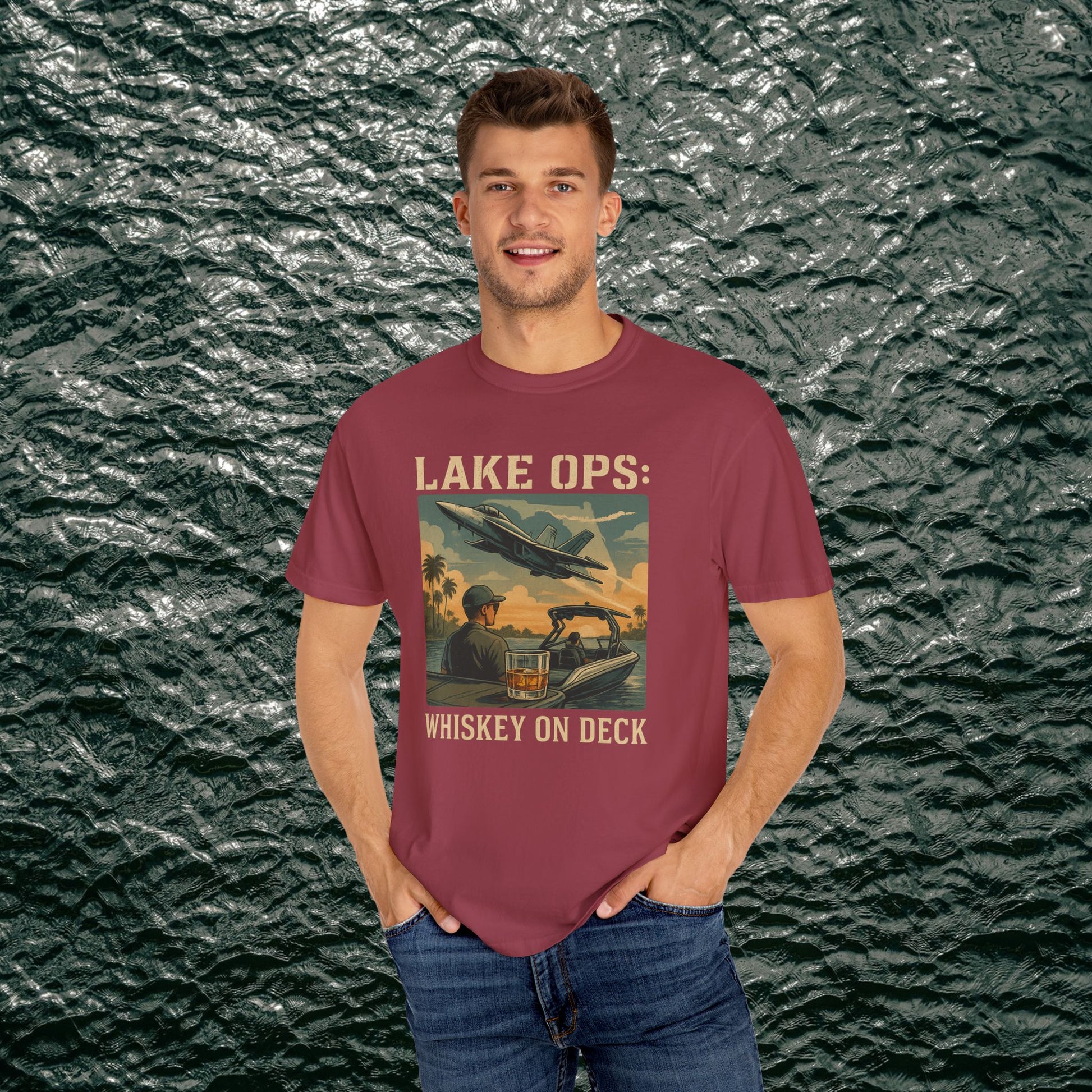 Garment-Dyed Comfort Tee For Adults in burgundy featuring a striking 'Lake Ops: Whiskey On Deck' illustration. Perfect for layering or summer wear.