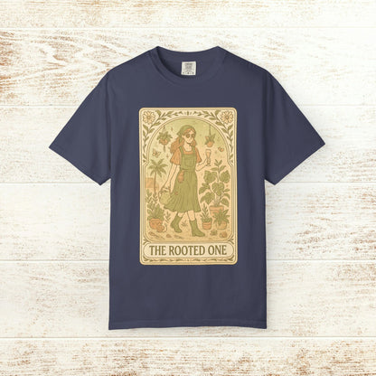 Rooted One Tarot Tee in navy color, showcasing a captivating tarot design with a woman and botanical elements, crafted from ethically sourced cotton.