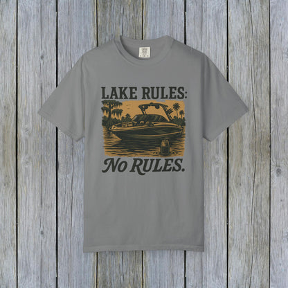 Gray Unisex Garment-Dyed Lake Rules Tee with a rustic boating design and the phrase 'Lake Rules: No Rules.' Great for lake lovers and casual wear.