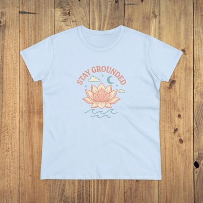 Front view of the Stay Grounded Spiritual Tee in light blue color, displaying a serene lotus graphic suited for summer events and casual wear.