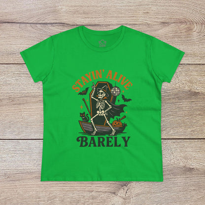 Stayin’ Alive T-Shirt in bright green with a whimsical skeleton graphic, making it a fun choice for Halloween. Comfortable unisex softstyle apparel.