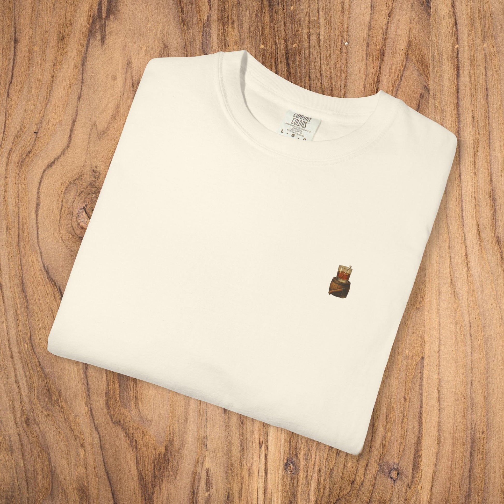 Premium Southern Made T-Shirt neatly folded on a wooden surface, showcasing stylish casual wear in an ivory color.