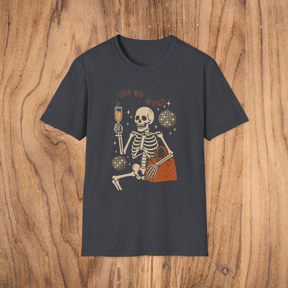 Spooky Spirits Graphic Tee in dark gray featuring a relaxed skeleton enjoying a beverage, a must-have for Halloween fun.