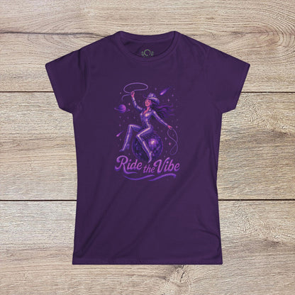 Vibrant Ride The Vibe Tee in deep purple highlighting a striking graphic of a woman riding a planet, produced with high-quality 100% ring-spun cotton.