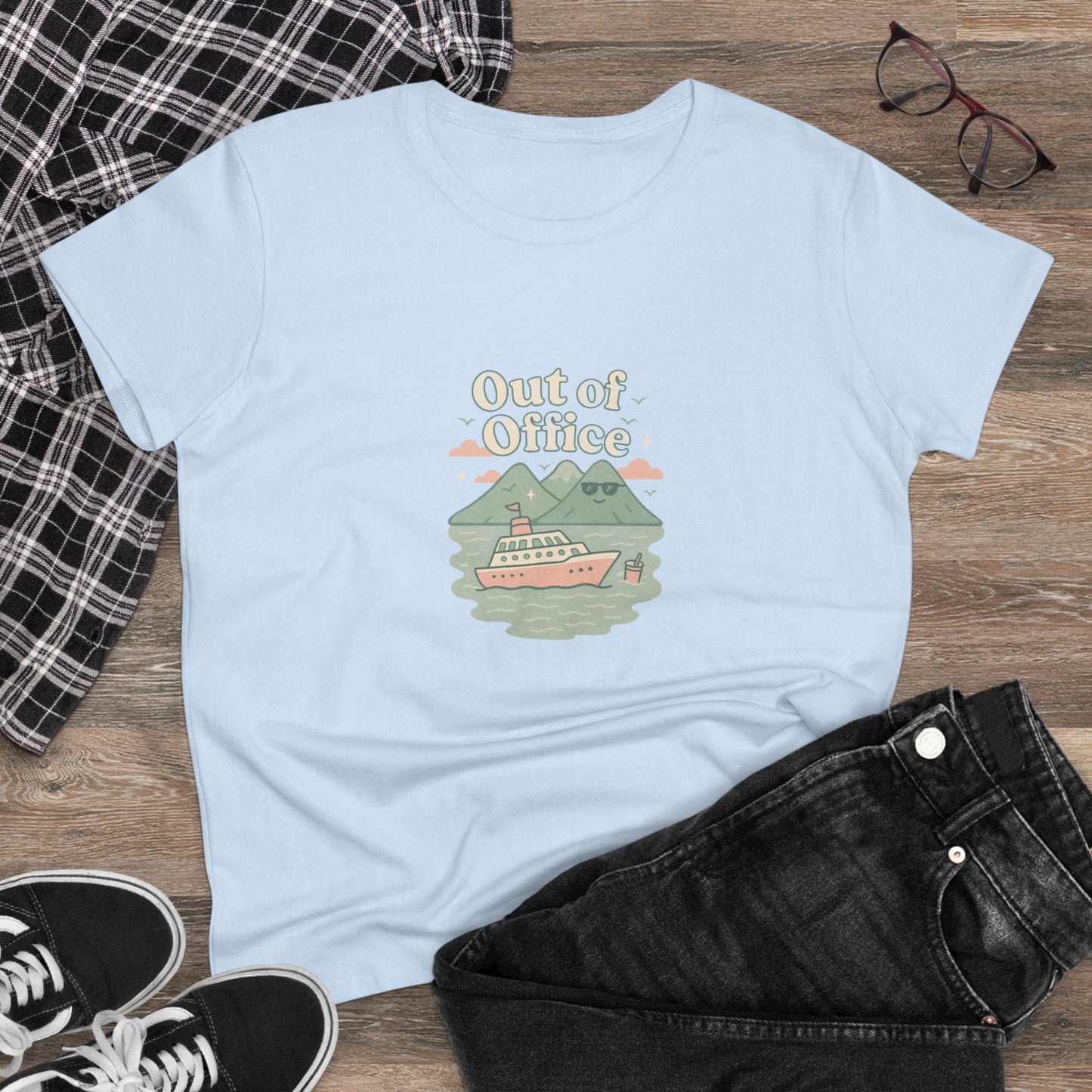 Casual display of the Out Of Office Cruise Tee styled with jeans and glasses, showcasing a comfortable summer look.