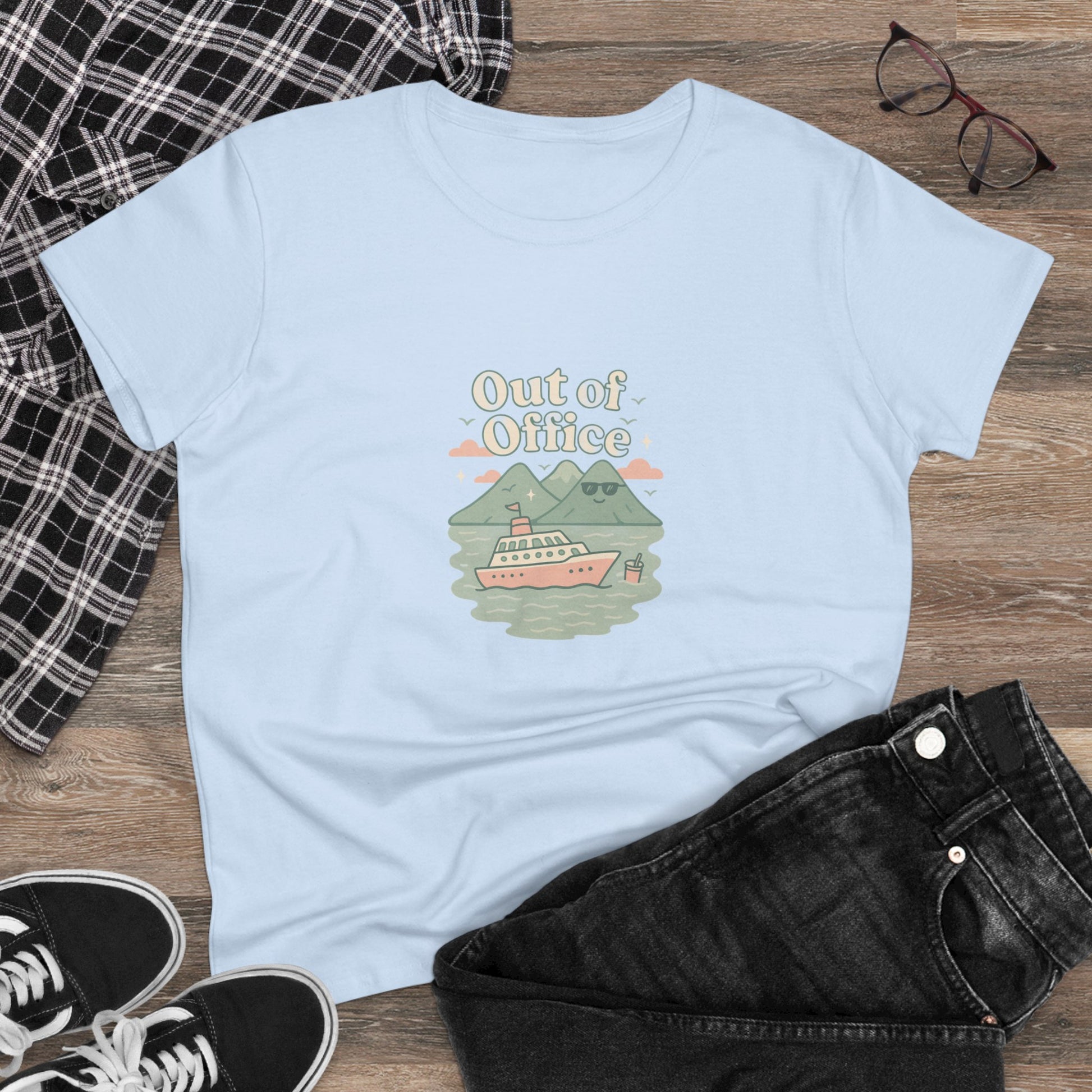Casual display of the Out Of Office Cruise Tee styled with jeans and glasses, showcasing a comfortable summer look.